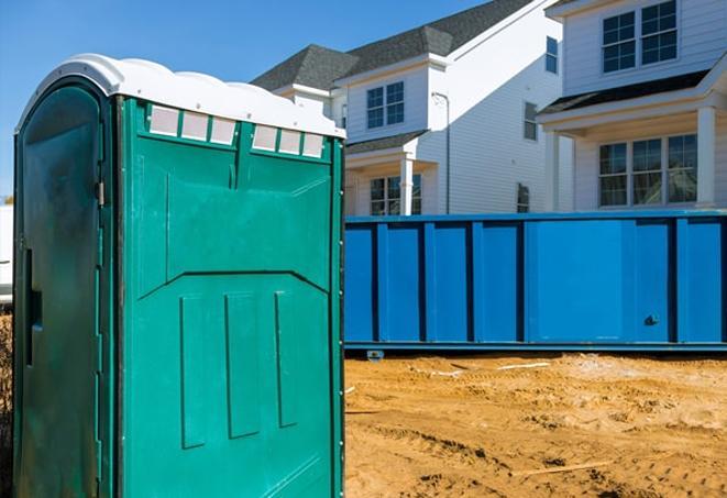 clean and efficient portable toilets available for workers at a job site